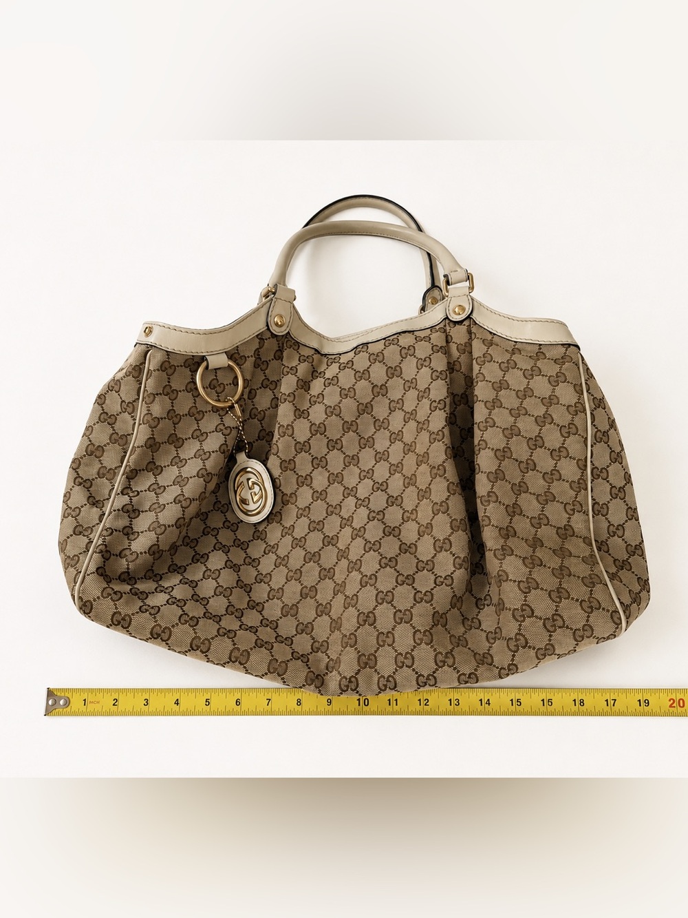 Gucci Brown GG Canvas hobo with Cream Trim and Gold Hardware